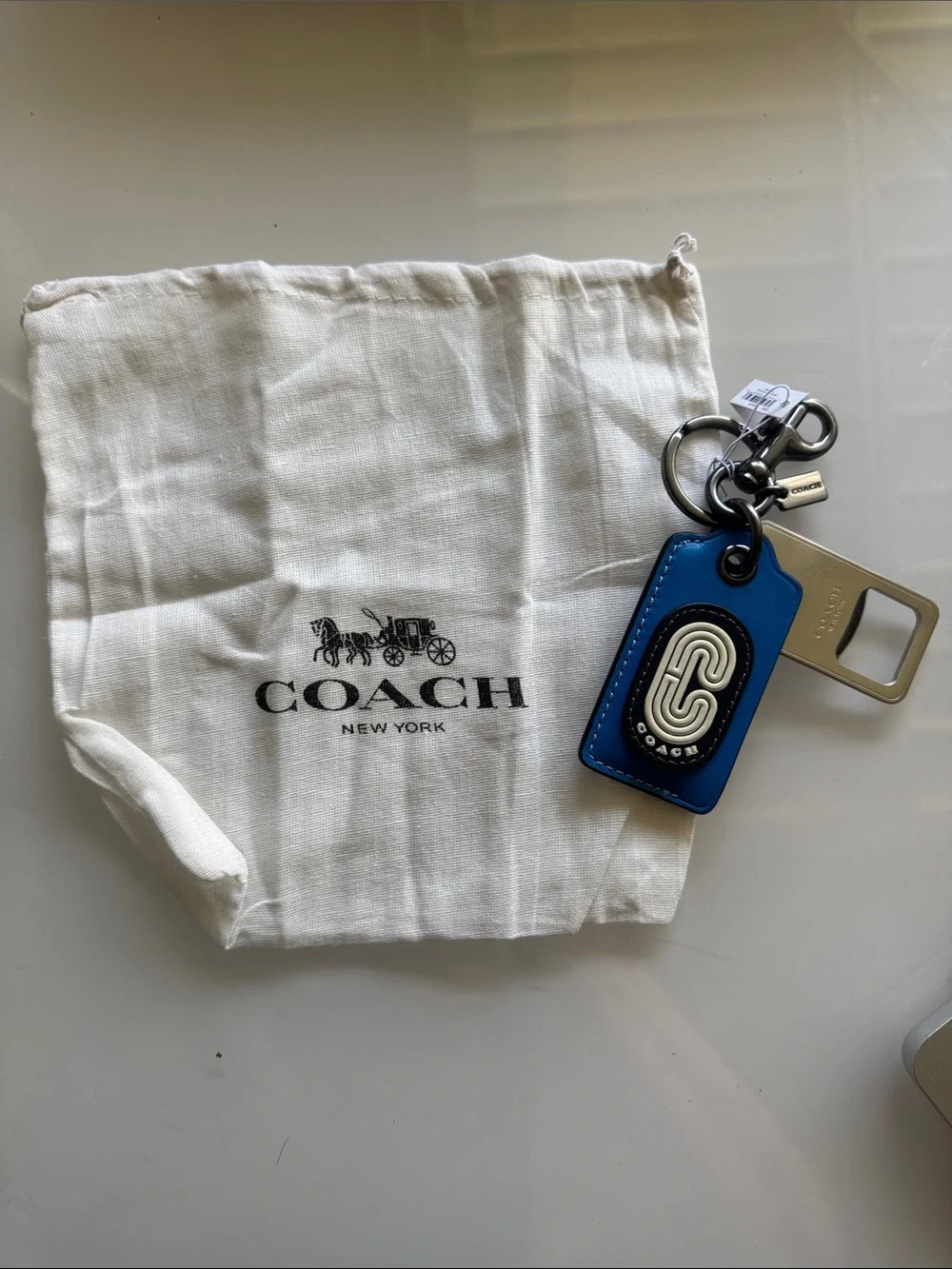 Coach Bottle Opener with Blue Leather  Logo Emblem